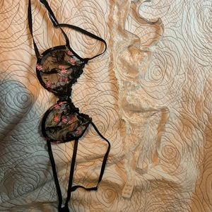 2 lace bras one white other black with flower prints and lace